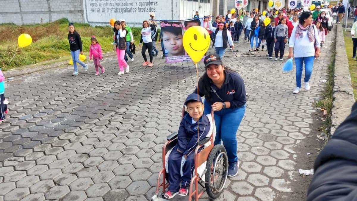 A family taking part in a community walk