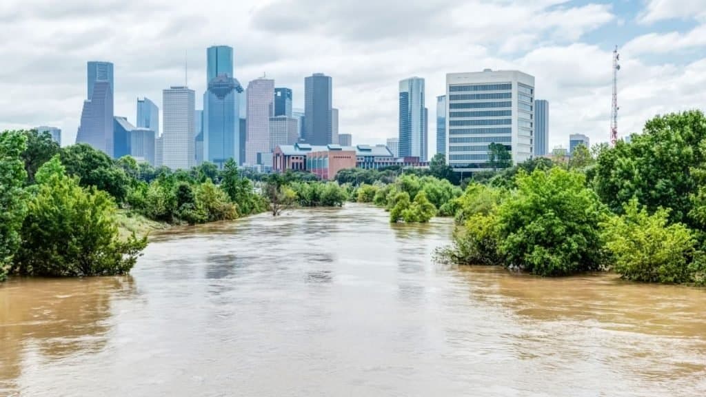 Floodwater surrounding a city and agricultural community