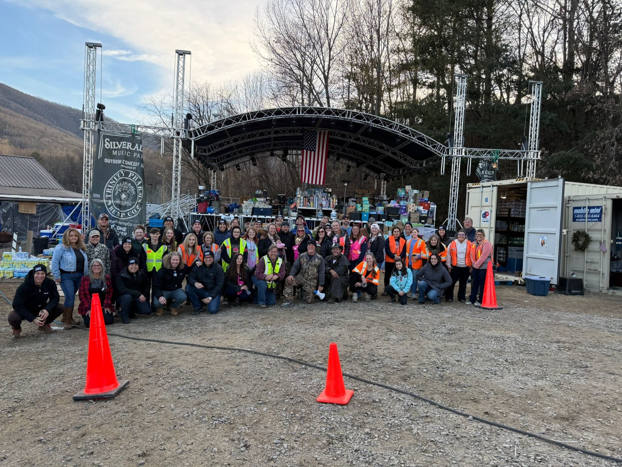 Volunteers organizing supplies for flood recovery